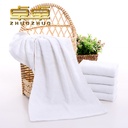 Factory wholesale 60g white towel weak twist thick absorbent bath hotel disposable white towel