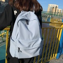 日系无印风双肩包男女大学生韩版大容量纯色背包初中高中学生书包