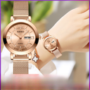 A generation of women's quartz watch non-mechanical Milan watch luminous waterproof double calendar female student alloy wrist watch
